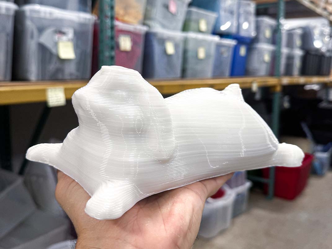 3d printed white bunny in a warehouse